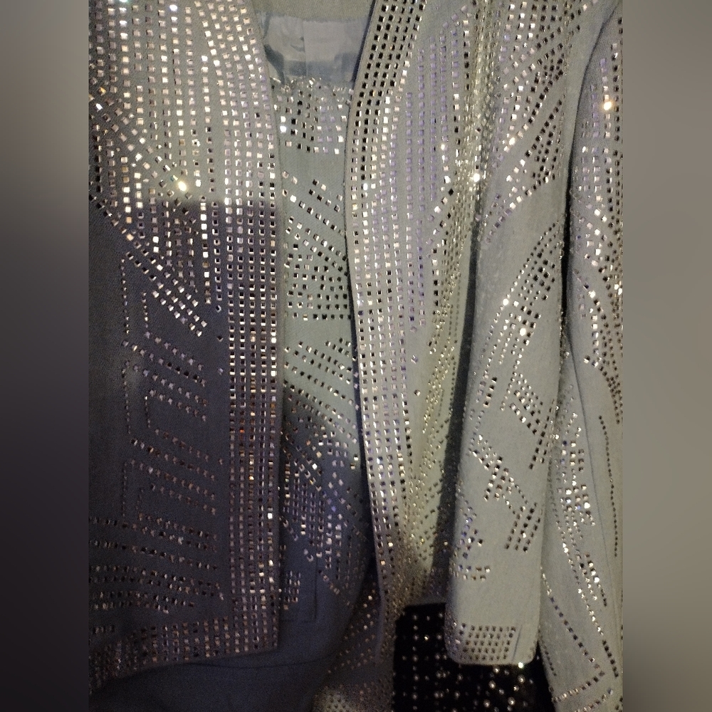 A two piece sequins jeans suit